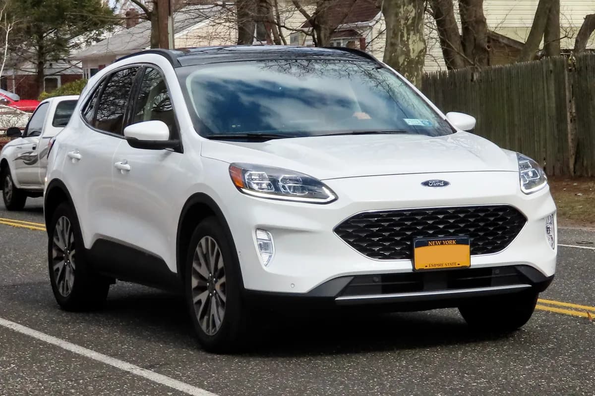 A white Ford Escape SUV, front three-quarter view
