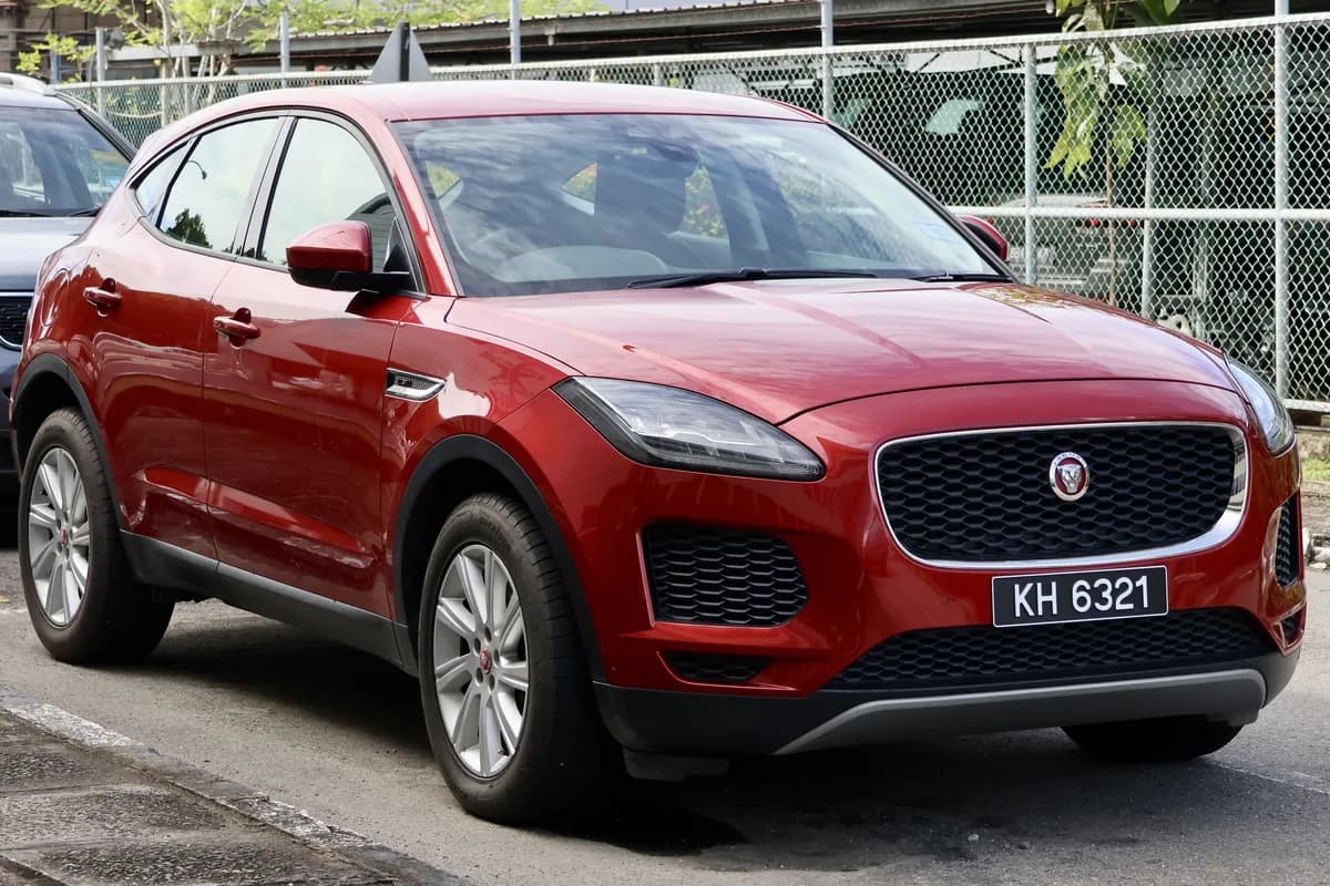 A red Jaguar E-Pace SUV, front three-quarter view