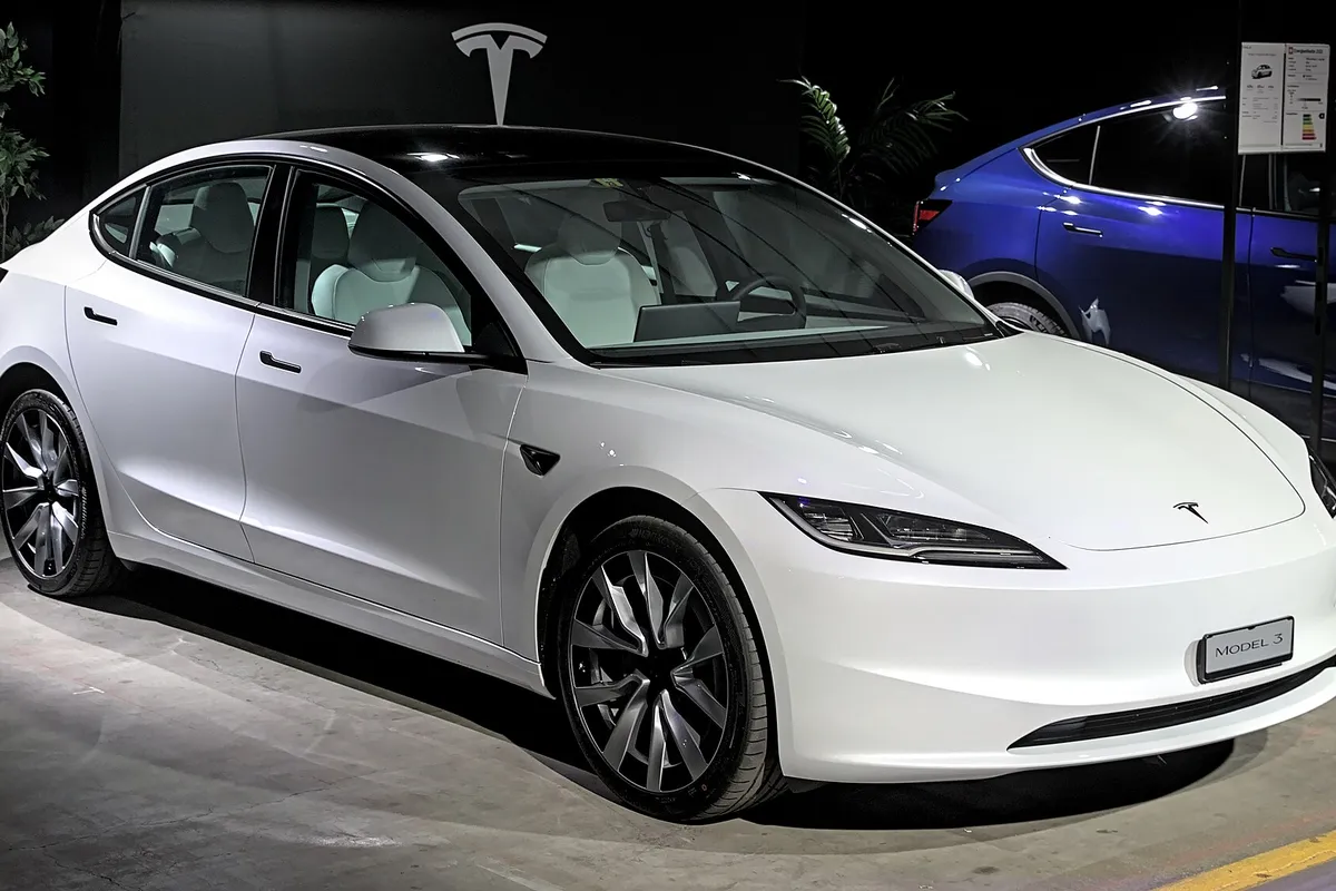 A Tesla Model 3, front three-quarter view