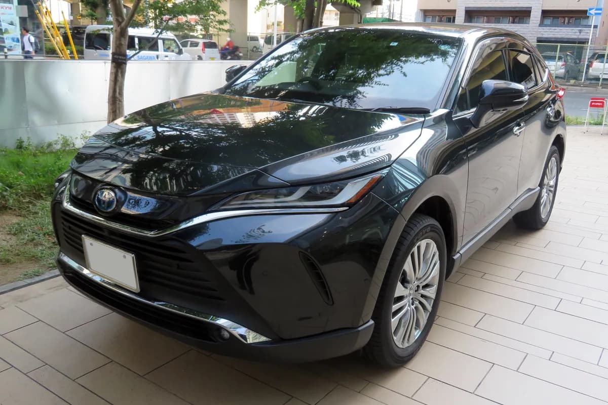 A black Toyota Harrier SUV, front three-quarter view